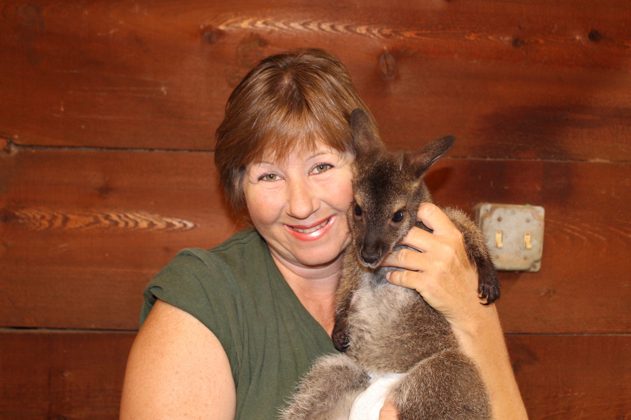 Tammy Norris holding wallaby.