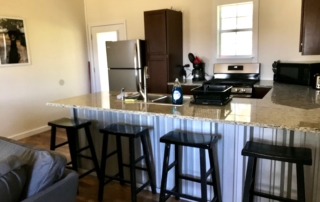 Outback Shack kitchen counter and stools.